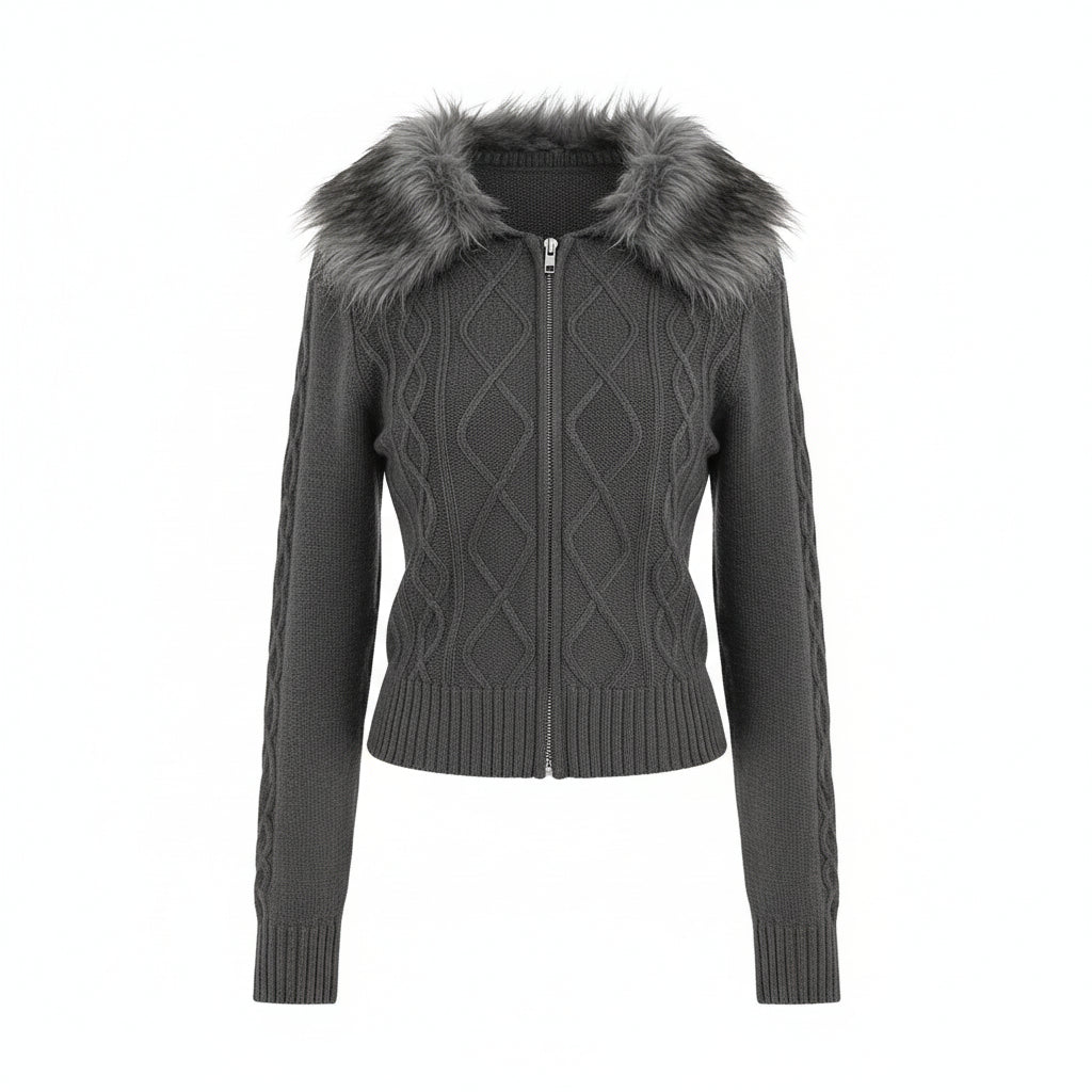 Person wearing a gray cable knit hoodie with fur trim in a room.