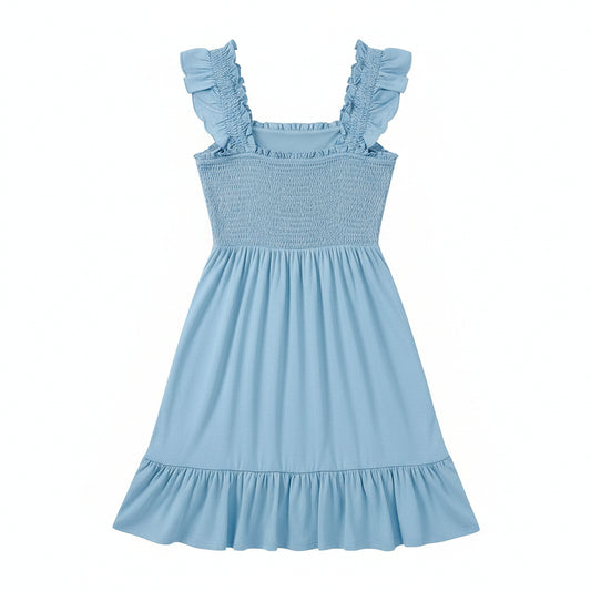 Light blue dress with ruffled sleeves and hem, held by a person against a plain background