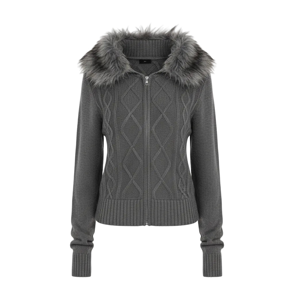 Person wearing a gray cable knit sweater with fur collar in a room.